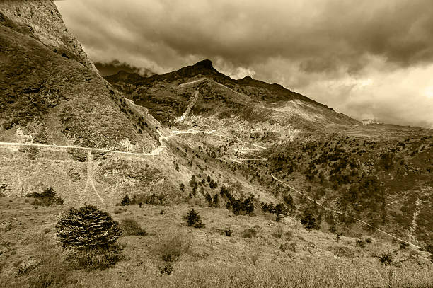 Beautiful famous curvy roads on Old Silk Route, Silk trading route between China and India, Sikkim - tinted image